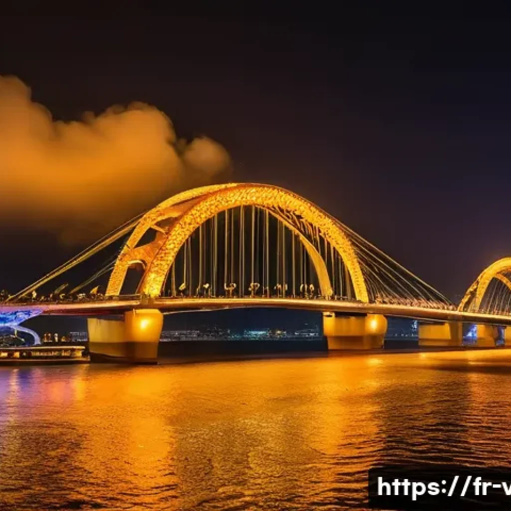 베트남 다낭 용다리 - A majestic golden Dragon Bridge in Da Nang, Vietnam, spanning the Han River at night. The bridge is ...